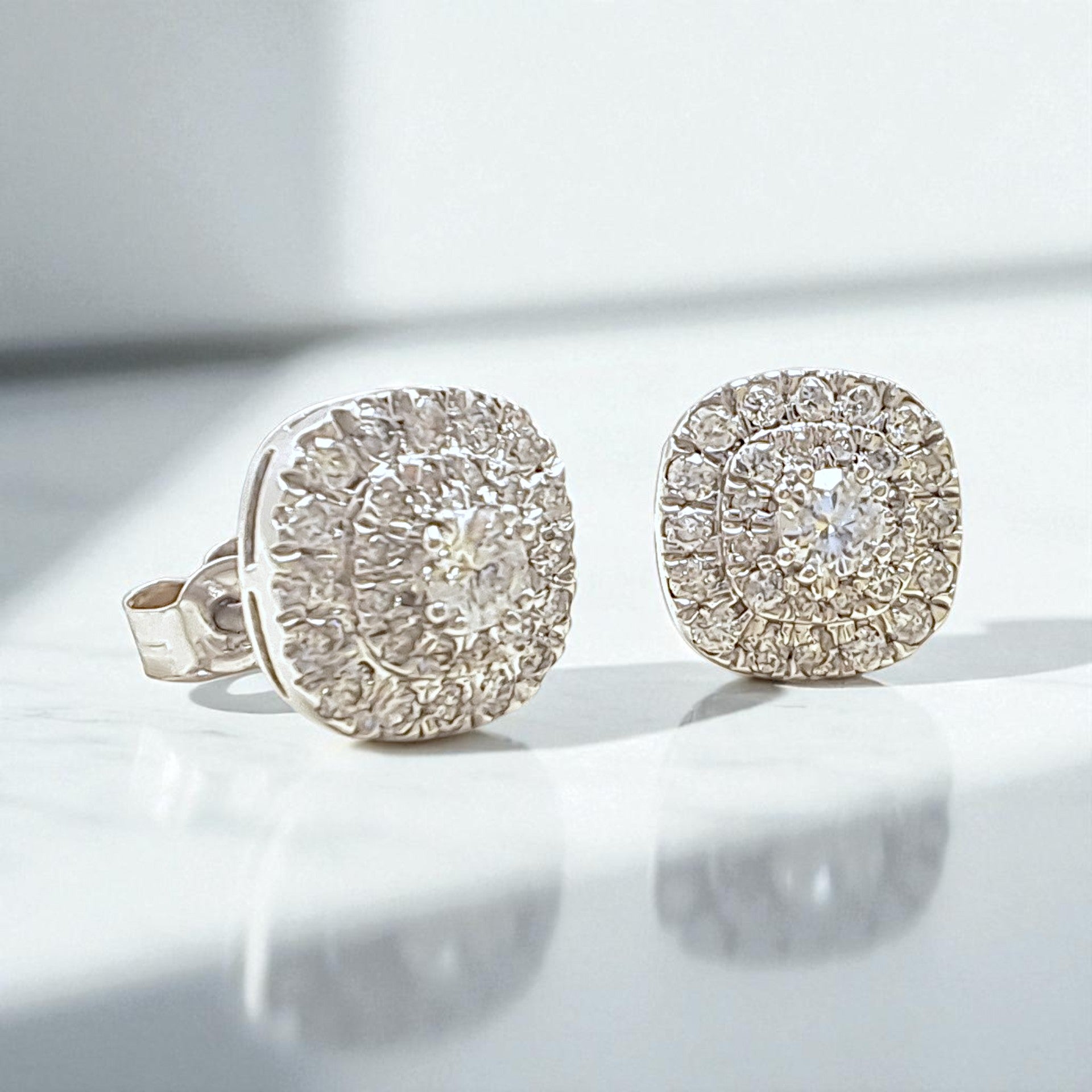 Vintage “Celestia’s Secret” 9ct White Gold & 0.50ct Diamond Halo Stud Earrings