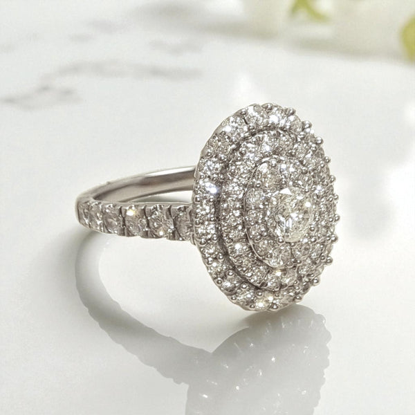 Vintage 'Celestia Oval' 18ct White Gold 1.25ct Diamond Oval Cluster Ring