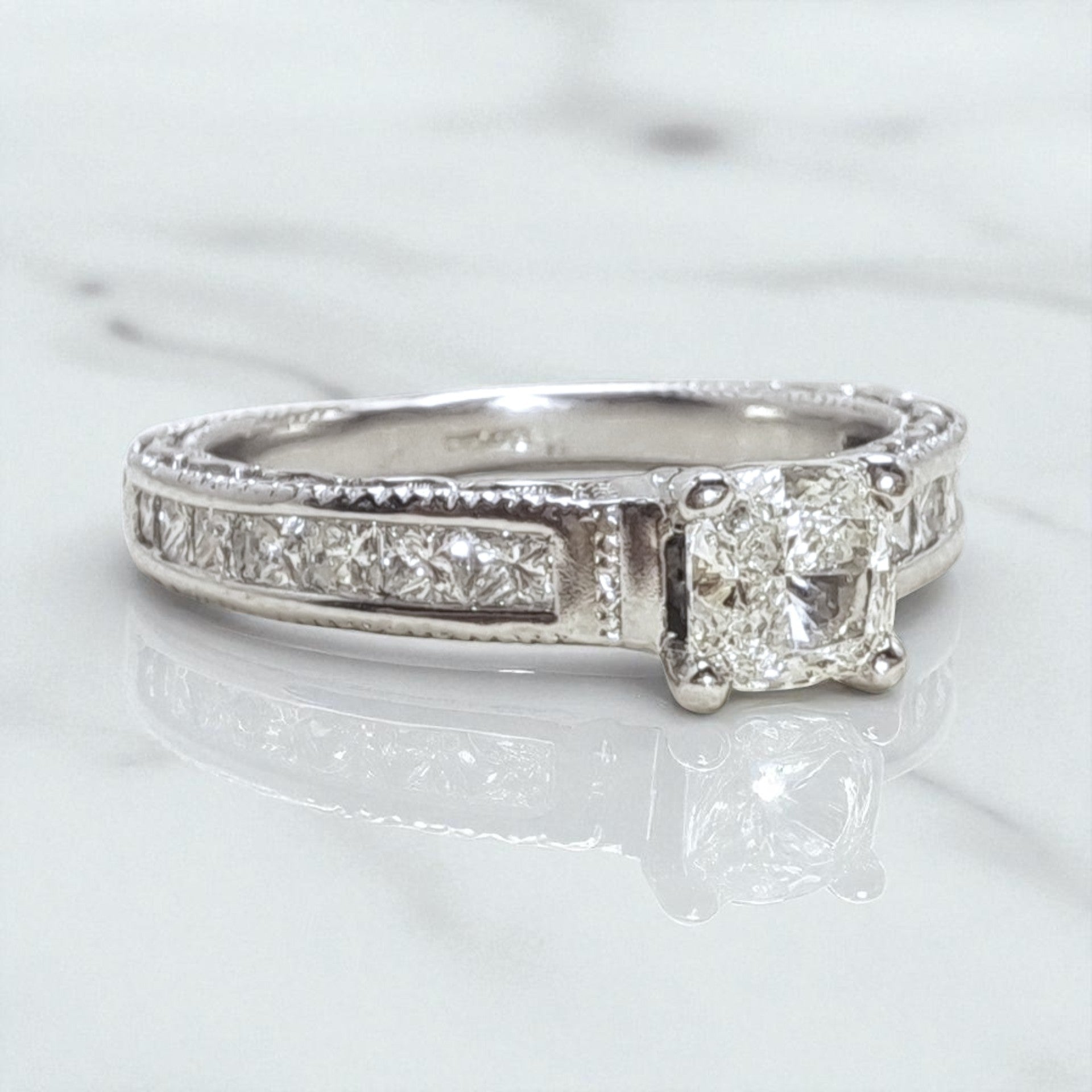 Vintage 'Elowen Beauty' 18ct White Gold 0.44ct Cushion Diamond Ring with Princess-Cut Shoulders and Engraved Band